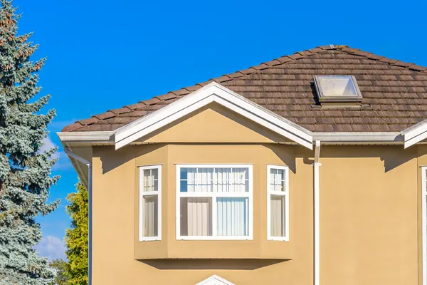 Architectural shingle roof detail on an Aurora home